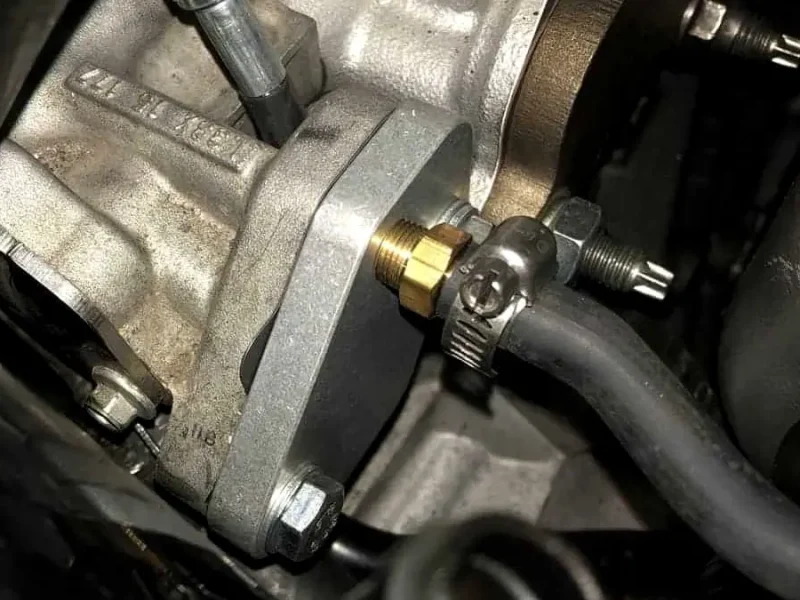 Emissions pipework and valve in a diesel engine bay